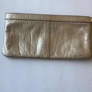 COACH Gold Wrislet/clutch